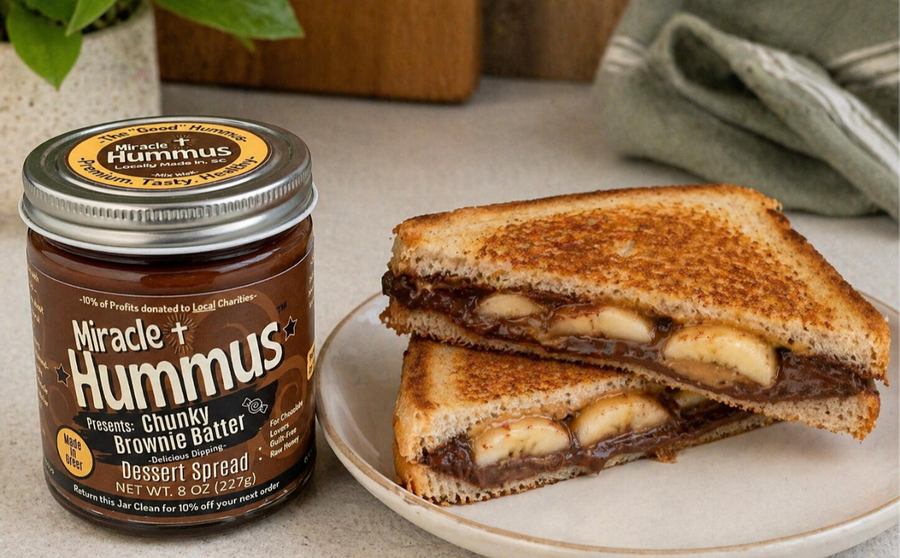Jar of Good Hummus with a chocolate dessert spread sandwich on a plate